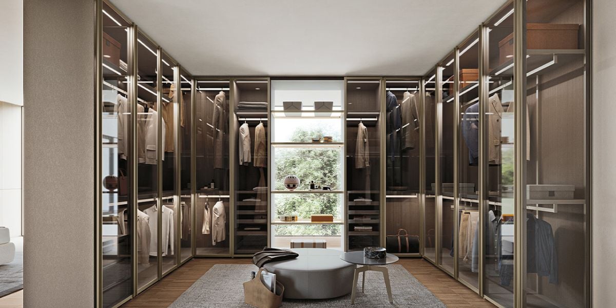 Premium bespoke fitted wardrobe interior with modular drawer inserts, pull-out racks and soft-close hardware