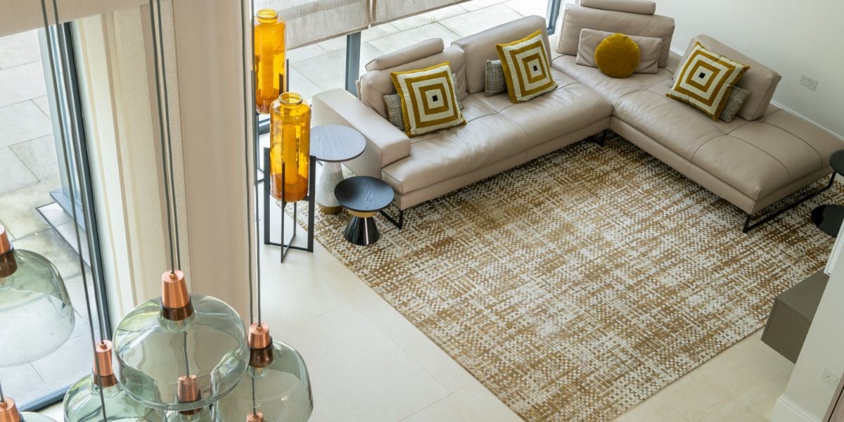 Large open plan living room with rug