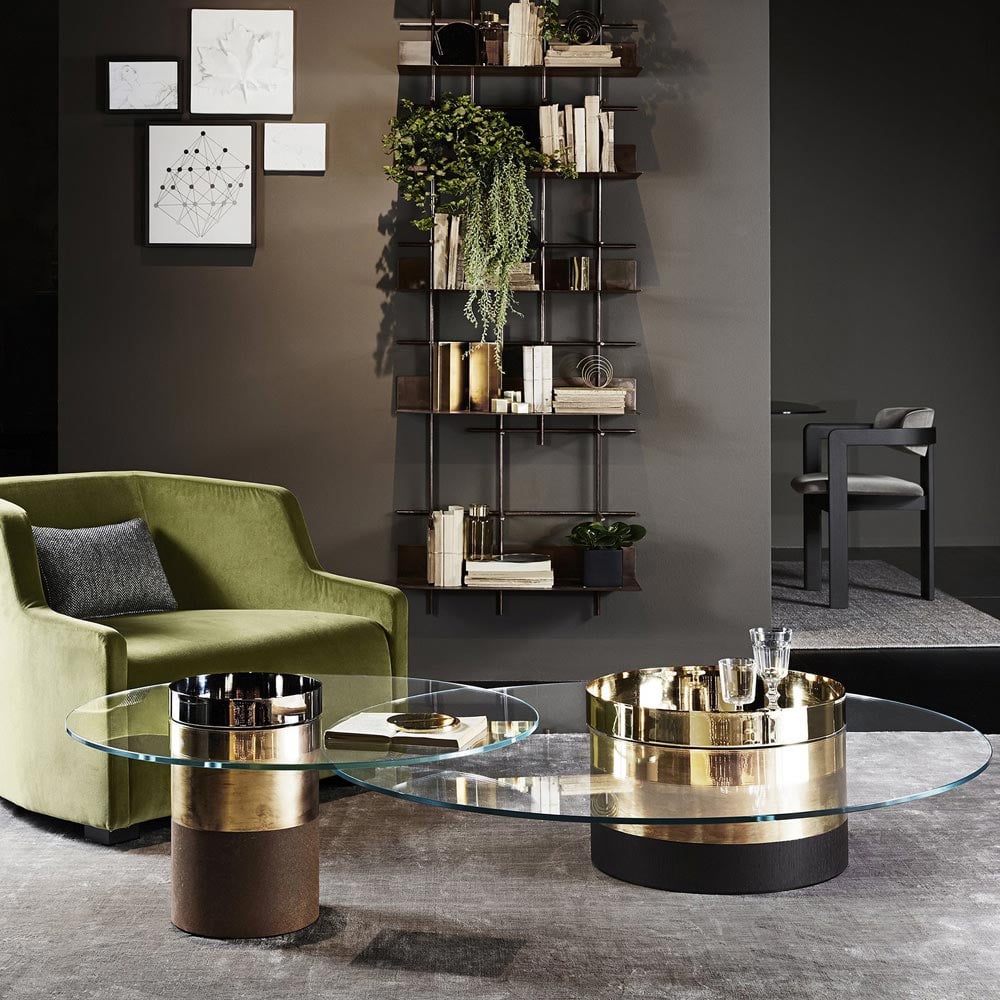 Elegant coffee table positioned in front of luxury reclining sofa in sophisticated living room setting
